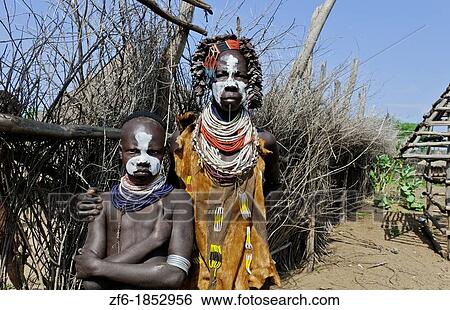 Korcho Ethiopia Africa village Lower Omo Valley Karo tribe with painted faces 25 View Large Photo Image Stock Photograph - Korcho Ethiopia Africa village Lower Omo Valley Karo tribe with painted faces 25. Fotosearch