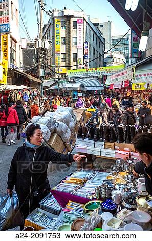 Stock Image - Korea, Seoul City, Myeongdong District, street scene.. Fotosearch