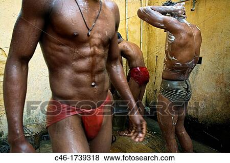 Stock Photo - Kusti wrestlers, Hanuman Akhara, Varanasi, Uttar Pradesh, India.. Fotosearch