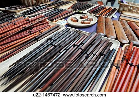 Stock Image - Kyoto (Japan): chopsticks sold at the Tenjin flea market, by the Kitano Tenmangu shrine. Fotosearch