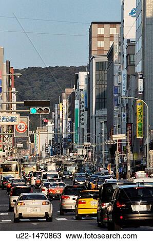 Kyoto (Japan): urban traffic in the city centre View Large Photo Image Stock Image - Kyoto (Japan): urban traffic in the city centre. Fotosearch