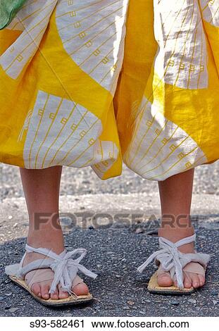 Stock Image - Kyoto Jidai Matsuri? 06 (The Festival of the Ages). Legs of a boy attendant.. Fotosearch