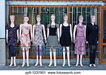 Stock Image - Kyrgyzstan - Bishkek - Mannikins outside a clothes shop. Fotosearch