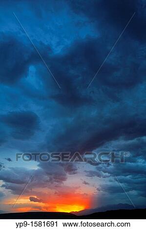 Kyrgyzstan - Toktogul - stormclouds and sunset above mountains View Large Photo Image Stock Image - Kyrgyzstan - Toktogul - stormclouds and sunset above mountains. Fotosearch