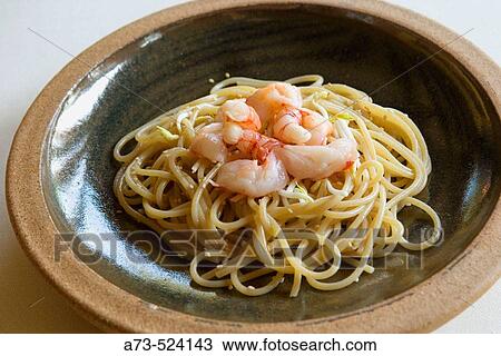 Stock Image - L? Albereta. Gualtiero Marchesi Restaurant.? Spaghetti ai Gamberi Crudi e Germogli di Soia?. Erbusco, province of Brescia, in Lombardy.. Fotosearch