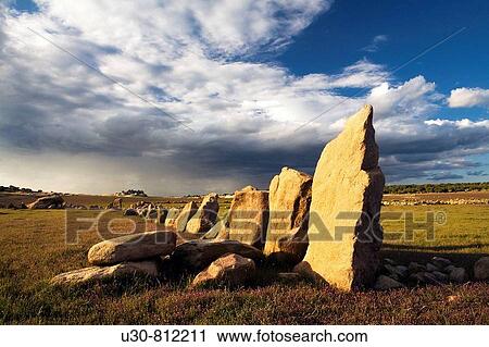 Stock Image - La Almendra dam without water Old abandoned farms Remnants of stone fences of the farms Monleras, province of Salamanca, Castilla y Leon, Spain. Fotosearch