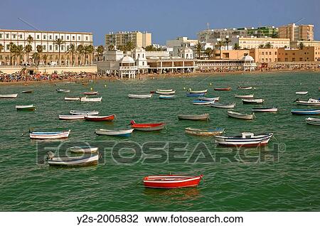 Stock Image - La Caleta beach and boats, Cadiz, Region of Andalusia, Spain, Europe.. Fotosearch