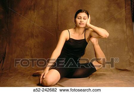 Lady doing yoga posture sadhukubdi View Large Photo Image Stock Image - Lady doing yoga posture sadhukubdi. Fotosearch
