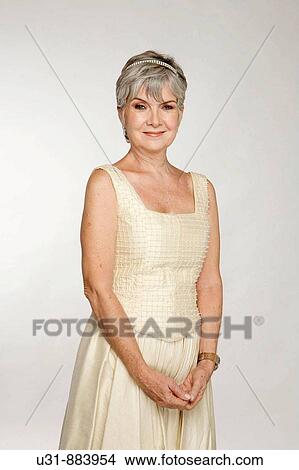 Lady in her early 60s in a studio setting View Large Photo Image Picture - Lady in her early 60s in a studio setting. Fotosearch