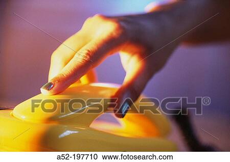 Lady picking up the phone View Large Photo Image Stock Image - Lady picking up the phone. Fotosearch