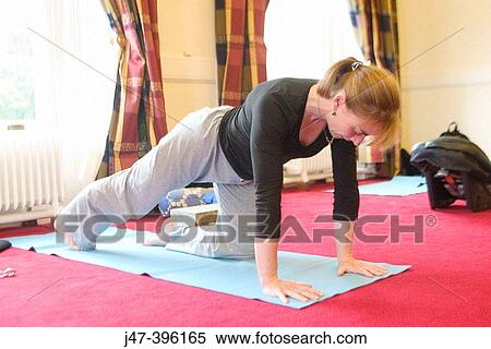 Lady teaching yoga View Large Photo Image Stock Photography - Lady teaching yoga. Fotosearch