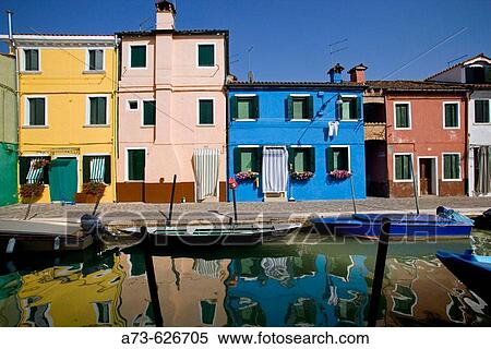 Laguna (lagoon) di Venezia. Burano. A canal with the typical colourful houses. Venice. Italy View Large Photo Image Stock Photography - Laguna (lagoon) di Venezia. Burano. A canal with the typical colourful houses. Venice. Italy. Fotosearch