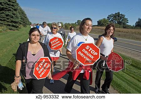Lake Orion, Michigan - People join Mothers Against Drunk Driving MADD? s 5K? Strides for Change? walk to create awareness of the dangers of drunk driving and to raise funds to combat drunk driving View Large Photo Image Stock Image - Lake Orion, Michigan - People join Mothers Against Drunk Driving MADD? s 5K? Strides for Change? walk to create awareness of the dangers of drunk driving and to raise funds to combat drunk driving. Fotosearch