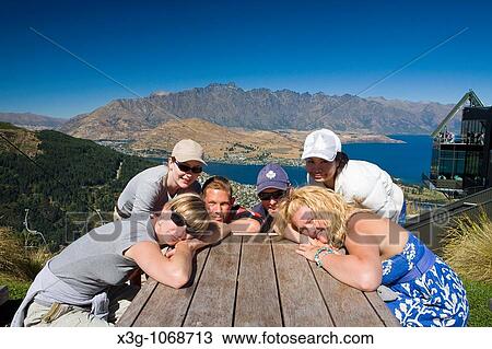 Stock Image - Lake Wakatipu is the stunning turquoise lake that is the main focus of Queenstown's splendor. Along with the lake, the Remarkable mountain range provides a stunning backdrop. Here is a view from atop Bob's Peak over the city.. Fotosearch