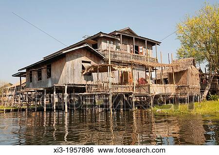 Lakeside house built on stilts, Inle Lake, Shan State, Myanmar, (Burma). View Large Photo Image Stock Photograph - Lakeside house built on stilts, Inle Lake, Shan State, Myanmar, (Burma).. Fotosearch