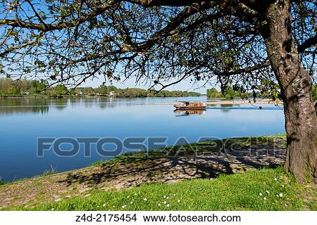 L'Amarante, a traditional Flat-Bottom Boat at Candes-Saint-Martin Village (One of the Most Beautiful Villages of France). View Large Photo Image Picture - L'Amarante, a traditional Flat-Bottom Boat at Candes-Saint-Martin Village (One of the Most Beautiful Villages of France).. Fotosearch