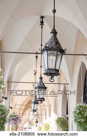 Lamp on Cloth Hall, Krakow, Poland, Europe. View Large Photo Image Stock Photography - Lamp on Cloth Hall, Krakow, Poland, Europe.. Fotosearch