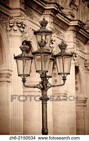 Lamp posts and columns at the Louvre Palace, Louvre Museum, Paris, France. View Large Photo Image Picture - Lamp posts and columns at the Louvre Palace, Louvre Museum, Paris, France.. Fotosearch
