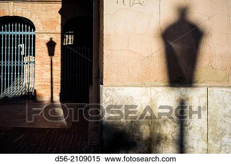 Lampost shadow on a wall, Valencia Bullring, Spain. View Large Photo Image Stock Photography - Lampost shadow on a wall, Valencia Bullring, Spain.. Fotosearch