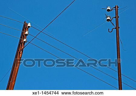 Picture - lamppost, electric cables, Santa Coloma de Queralt, Catalonia, Spain.. Fotosearch