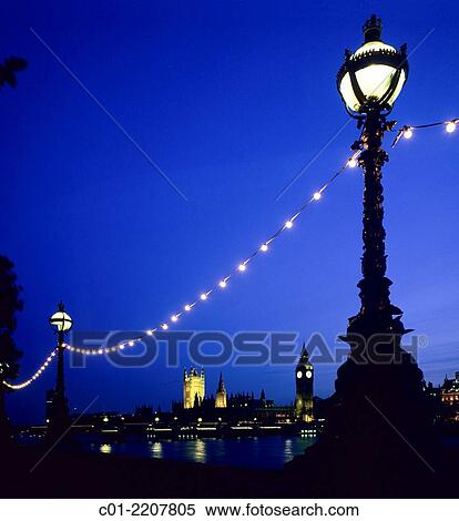 Lampposts and Westminster Palace with Big Ben clock tower at night London Great Britain. View Large Photo Image Stock Photography - Lampposts and Westminster Palace with Big Ben clock tower at night London Great Britain.. Fotosearch