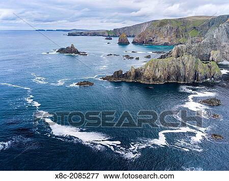 Landscape on West Shetland. The cliffs between Dale and Huxter close to Sandness Hill. Europe, Great Britain, Scotland, Northern Isles, Shetland, May. View Large Photo Image Stock Photo - Landscape on West Shetland. The cliffs between Dale and Huxter close to Sandness Hill. Europe, Great Britain, Scotland, Northern Isles, Shetland, May.. Fotosearch
