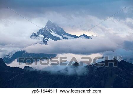 landscape with mountains and clouds, Bernese Oberland, Switzerland View Large Photo Image Stock Image - landscape with mountains and clouds, Bernese Oberland, Switzerland. Fotosearch