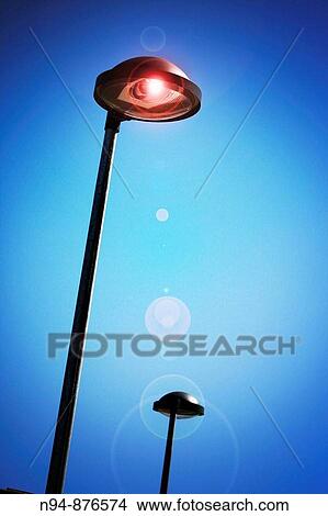 Picture - Lantern lit at dusk in the city of Valencia Alborache. Valencia. Spain. Europe.. Fotosearch