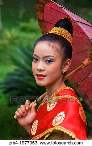 LAOS, LUANG PRABANG, LA RESIDENCE PHOU VAO HOTEL, LAOTIAN TEENAGE GIRL IN TRADITIONAL LOWLAND FESTIVE DRESS WITH PARASOL, MODEL RELEASE 2006-10-04. View Large Photo Image Stock Image - LAOS, LUANG PRABANG, LA RESIDENCE PHOU VAO HOTEL, LAOTIAN TEENAGE GIRL IN TRADITIONAL LOWLAND FESTIVE DRESS WITH PARASOL, MODEL RELEASE 2006-10-04.. Fotosearch