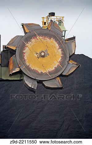 Large bucket wheel loader at coal terminal, Ridley Island, Prince Rupert, BC. View Large Photo Image Stock Image - Large bucket wheel loader at coal terminal, Ridley Island, Prince Rupert, BC.. Fotosearch