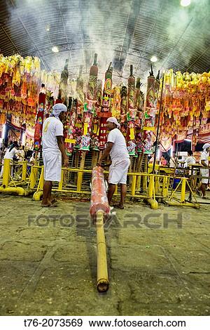 large rocket candles carrying prayers for good luck at the Vegetarian Festival in Bangkok, Thailand. View Large Photo Image Stock Photo - large rocket candles carrying prayers for good luck at the Vegetarian Festival in Bangkok, Thailand.. Fotosearch