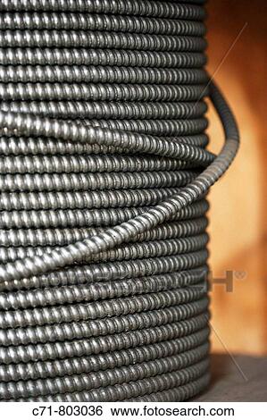 Large spool of industrial electrical wire View Large Photo Image Stock Photograph - Large spool of industrial electrical wire. Fotosearch