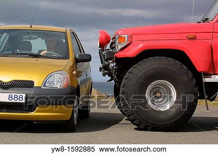 Large truck with small car View Large Photo Image Stock Photography - Large truck with small car. Fotosearch