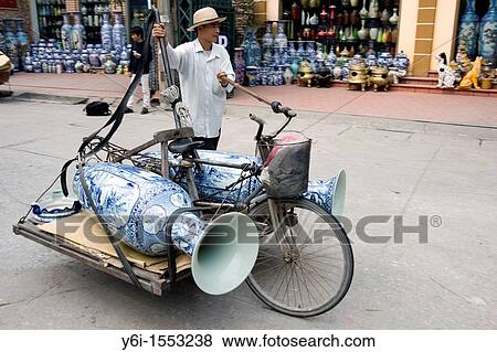 Large vases loaded on platform bicycle Bat Trang pottery village near Hanoi Vietnam View Large Photo Image Stock Photo - Large vases loaded on platform bicycle Bat Trang pottery village near Hanoi Vietnam. Fotosearch