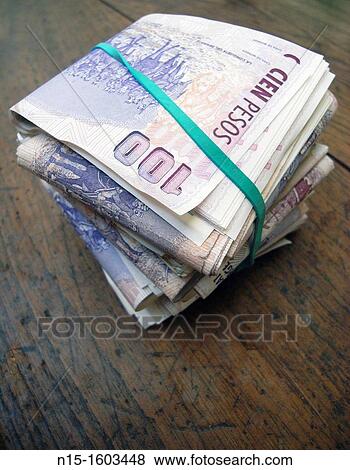 Large wad of 100-peso notes, Argentina View Large Photo Image Stock Photo - Large wad of 100-peso notes, Argentina. Fotosearch