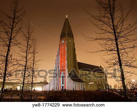 Stock Photo - Laser light show on Hallgrimskirkja Church, Reykjavik, Iceland Annual winter lights festival in Reykjavik. Fotosearch