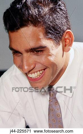 Latin businessman smiling View Large Photo Image Stock Image - Latin businessman smiling. Fotosearch