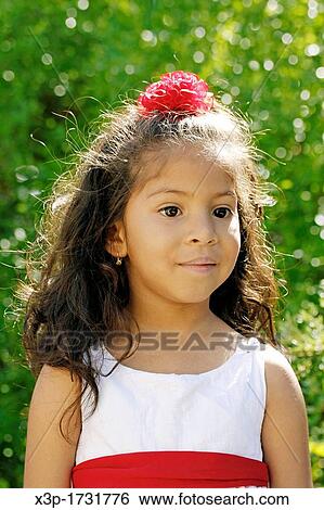 Stock Photograph - Latin little girl portrait. Fotosearch