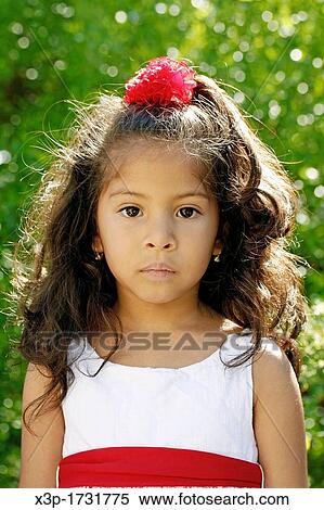 Stock Photography - Latin little girl portrait. Fotosearch