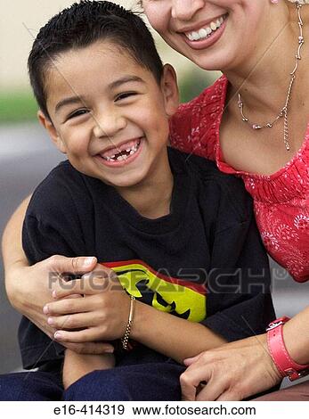 Latin mother and son laughing together View Large Photo Image Stock Photo - Latin mother and son laughing together. Fotosearch