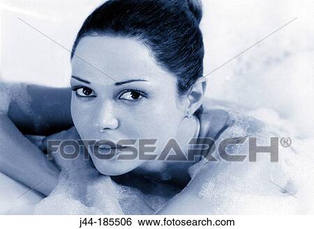 Latin woman in the bathtub View Large Photo Image Stock Photograph - Latin woman in the bathtub. Fotosearch