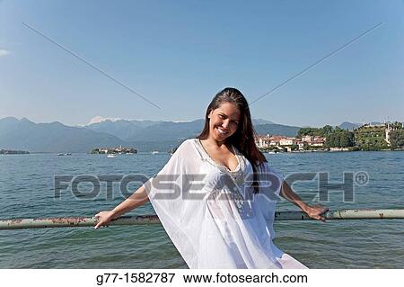 Stock Photo - Latin woman on Lake Maggiore, Italy.. Fotosearch