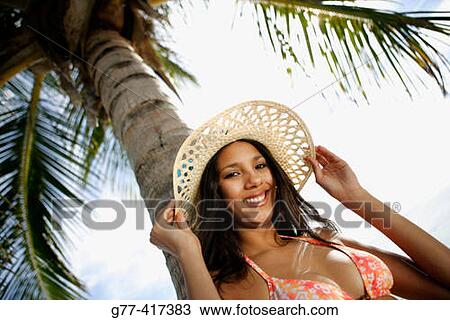 Latin woman on the beach. Key Byscaine. Miami. Florida. USA. View Large Photo Image Stock Image - Latin woman on the beach. Key Byscaine. Miami. Florida. USA.. Fotosearch