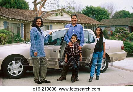 Latino family outside home View Large Photo Image Stock Photo - Latino family outside home. Fotosearch