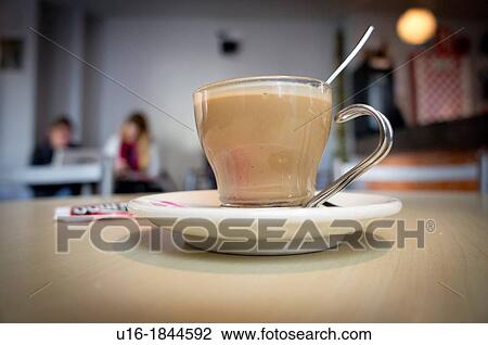 latte at a caf? with students View Large Photo Image Stock Image - latte at a caf? with students. Fotosearch