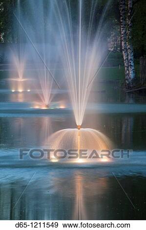 Latvia, Northeastern Latvia, Vidzeme Region, Gauja National Park, Cesis, May Park fountains, evening View Large Photo Image Stock Photo - Latvia, Northeastern Latvia, Vidzeme Region, Gauja National Park, Cesis, May Park fountains, evening. Fotosearch