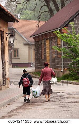 Stock Photography - Latvia, Northeastern Latvia, Vidzeme Region, Gauja National Park, Cesis, old town with people, NR. Fotosearch