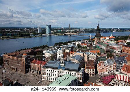 Latvia, Riga, Old Town, Rigas Doms (Riga Cathedral), left; Vansu Bridge in background View Large Photo Image Stock Photo - Latvia, Riga, Old Town, Rigas Doms (Riga Cathedral), left; Vansu Bridge in background. Fotosearch