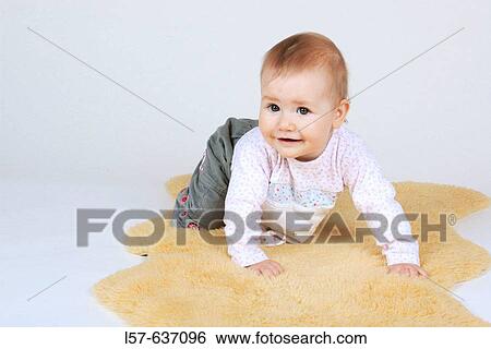 laughing baby, crawling, on sheep skin, Studio, Oetwil am See, Zuerich, Switzerland View Large Photo Image Stock Photograph - laughing baby, crawling, on sheep skin, Studio, Oetwil am See, Zuerich, Switzerland. Fotosearch