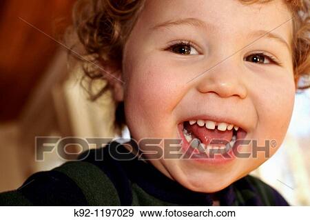 Laughing child View Large Photo Image Stock Photo - Laughing child. Fotosearch